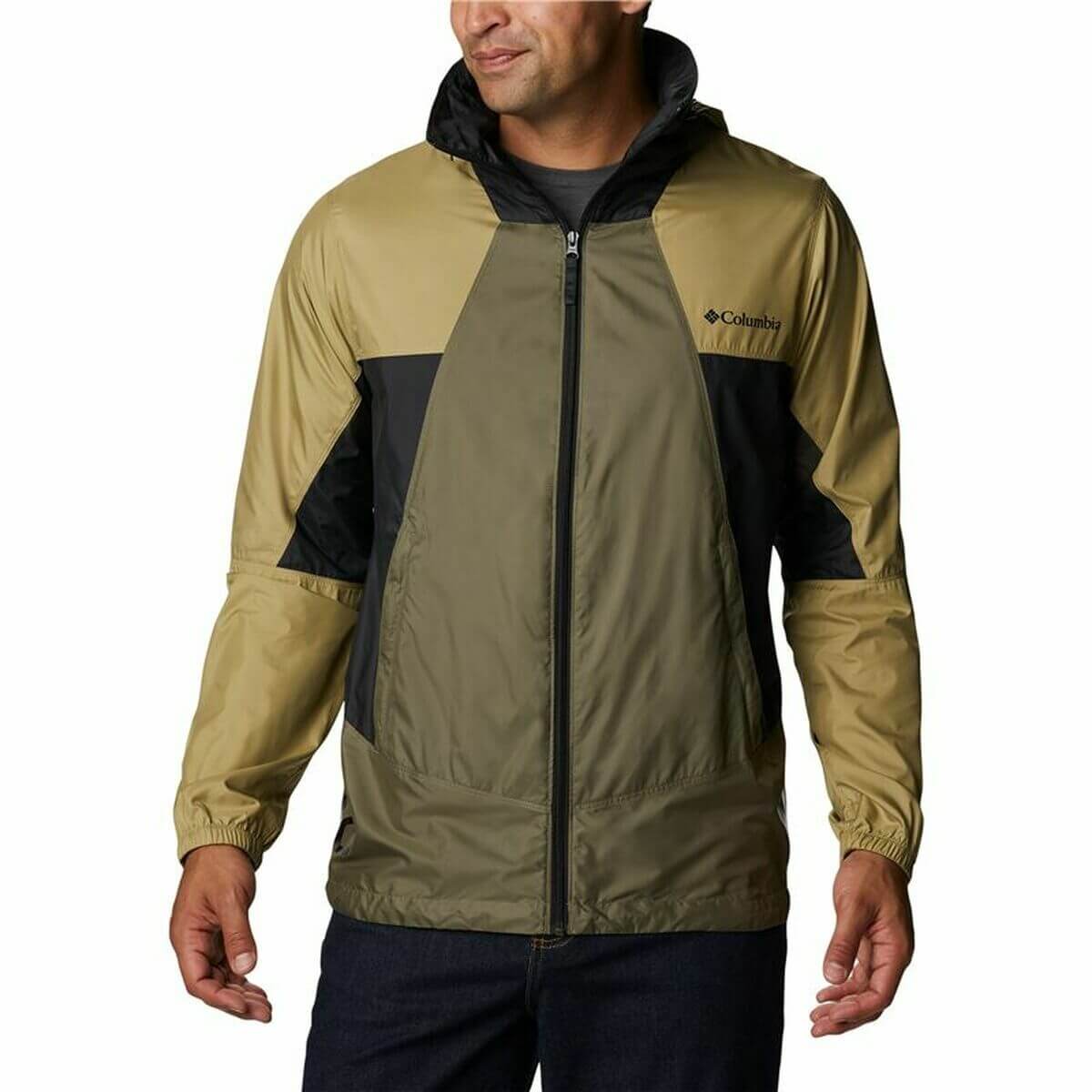 Man wearing Columbia Point Park windcheater jacket in green, ideal for outdoor activities and camping adventures.