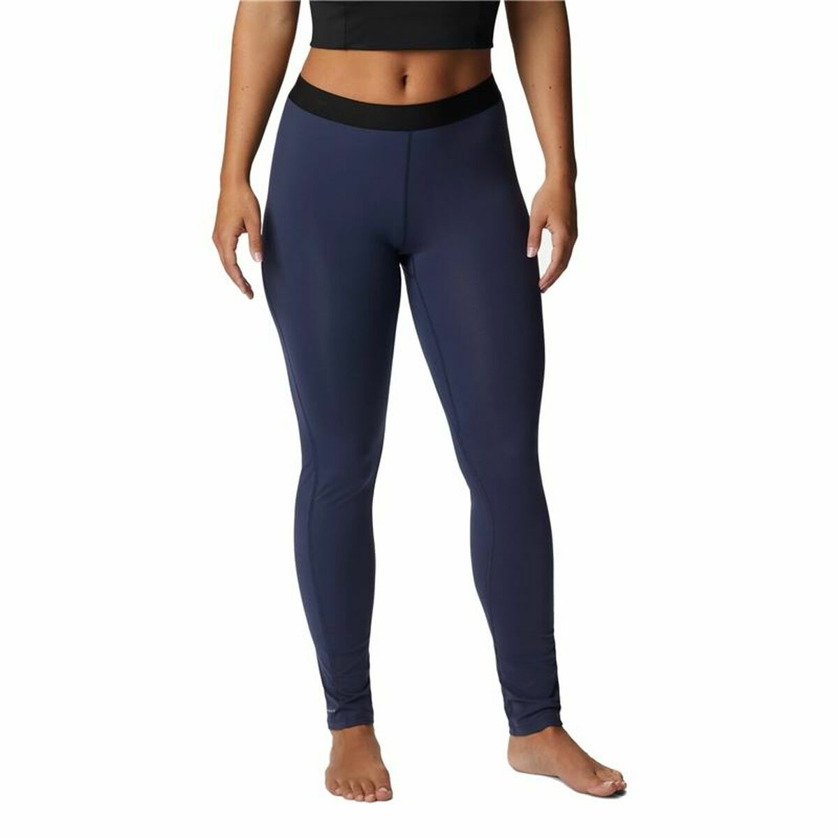 Dark blue sport leggings for women by Columbia, perfect for outdoor adventures and camping activities.