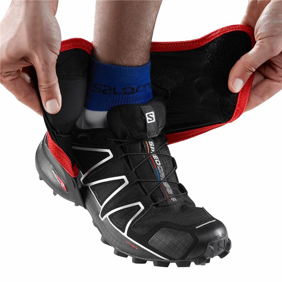 Salomon Trail High ankle support shown being worn for outdoor adventure; ideal for camping; unisex design.
