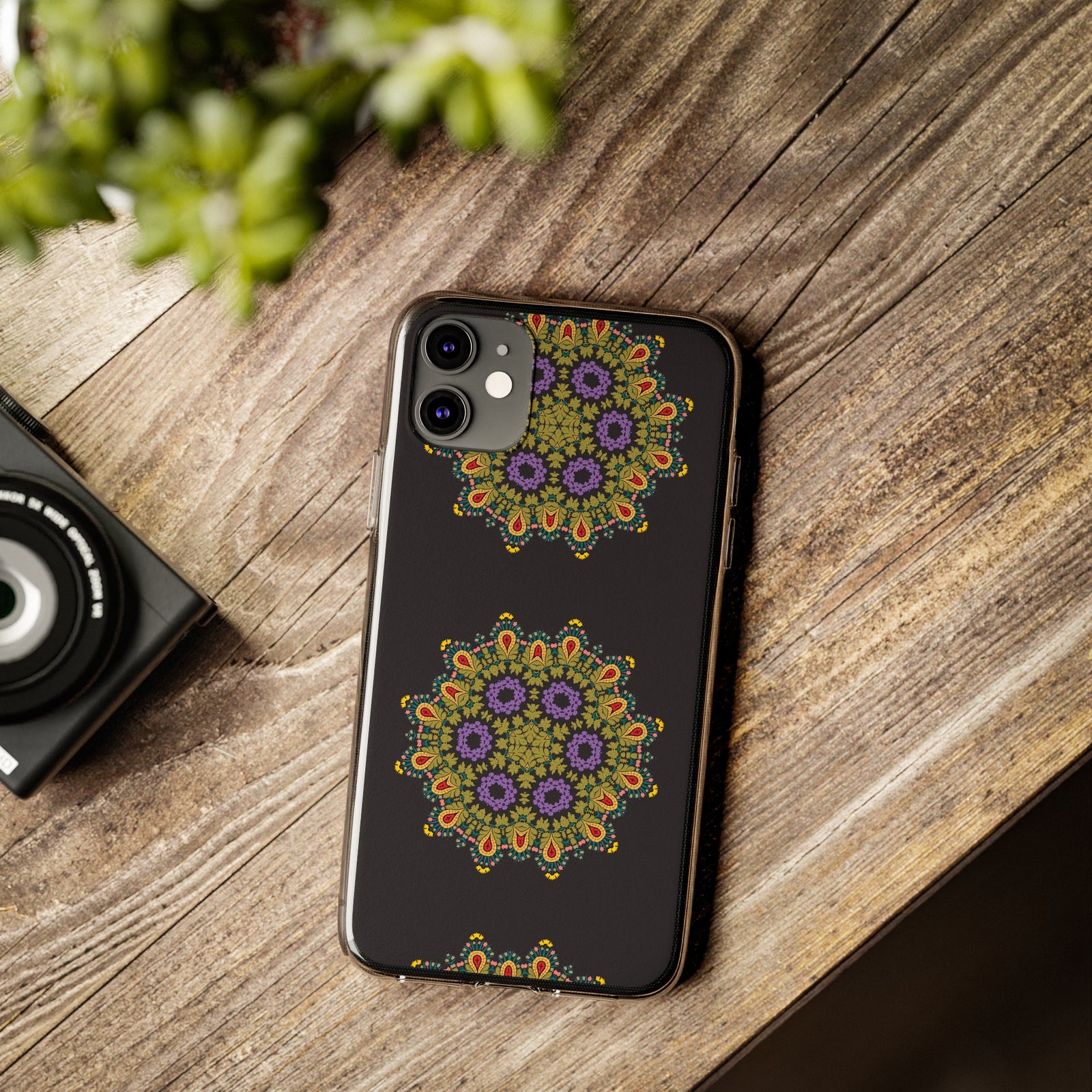 Phone case featuring a vibrant gold mandala design, ideal for outdoor adventures and camping, from revlando.com.