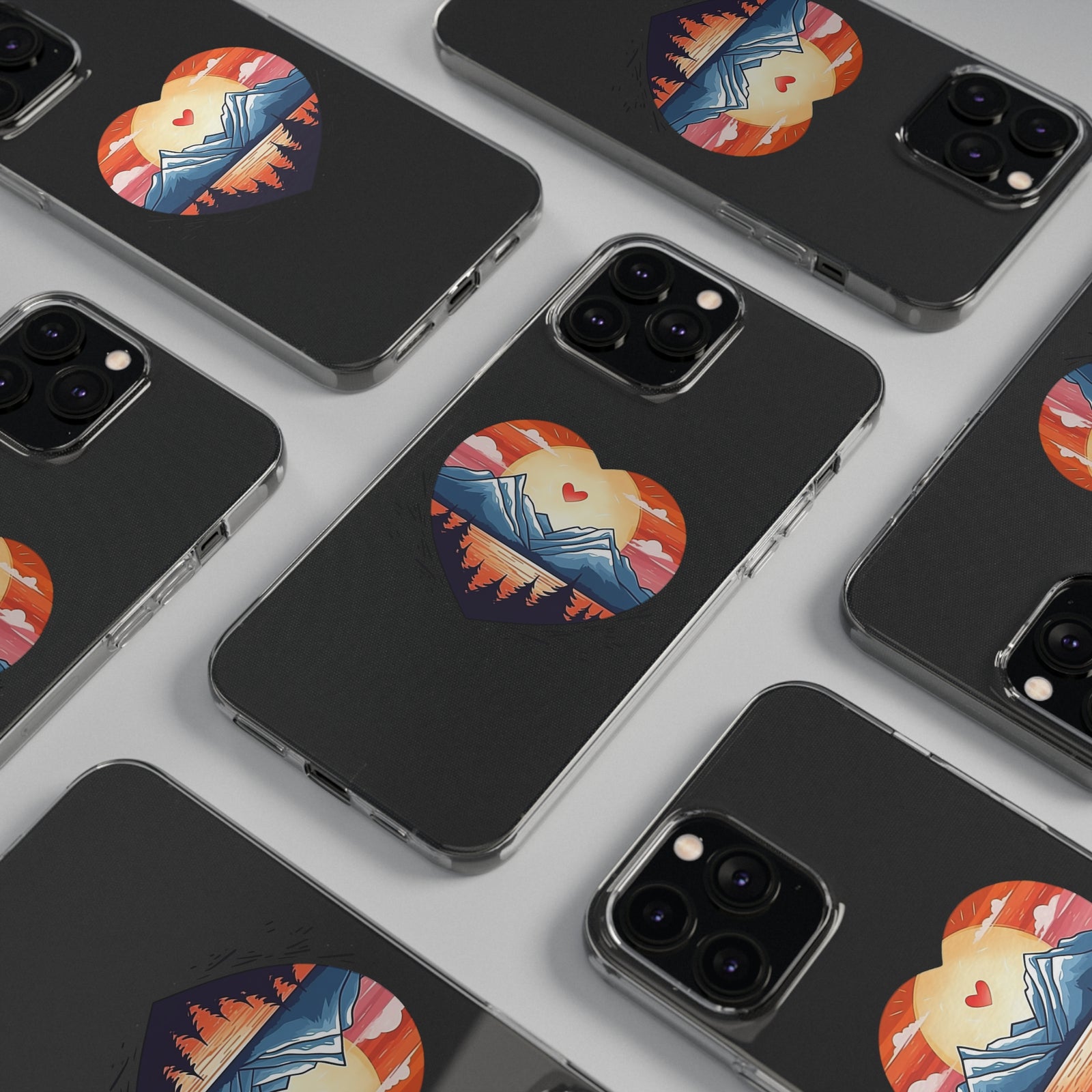 Colorful mountain-themed phone cases featuring heart designs, perfect for outdoor enthusiasts and adventurers.