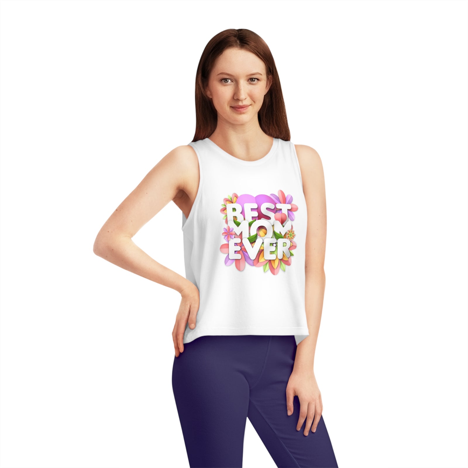 Woman wearing a cropped tank top with 'Best Ever' floral design, perfect for outdoor adventures.