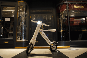 Limited Edition Cruzaa Electric Scooter in a stylish urban setting, showcasing its unique design and outdoor adventure potential.