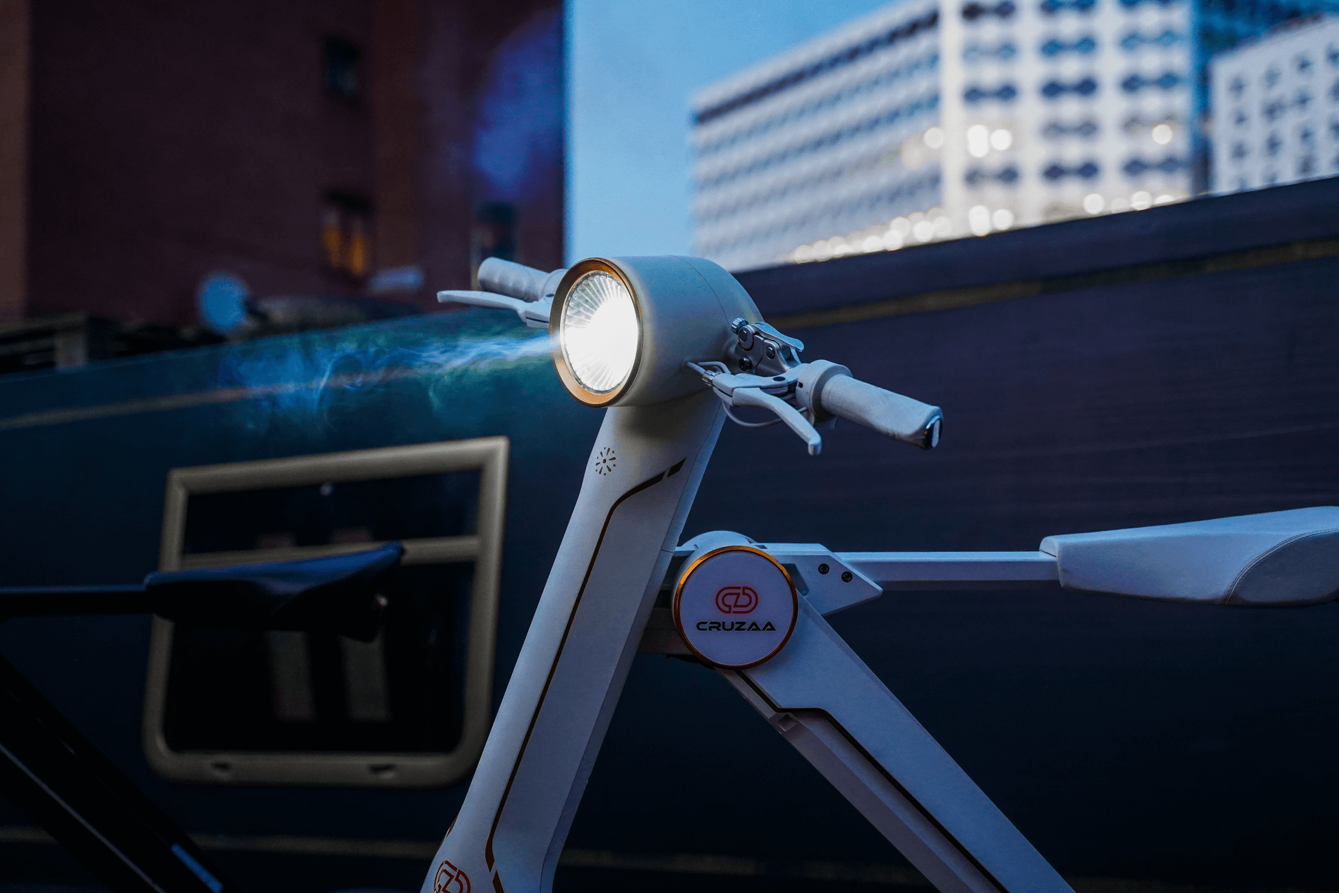 Close-up of the Cruzaa electric scooter's front light, showcasing its sleek design in an urban setting, perfect for outdoor adventures.