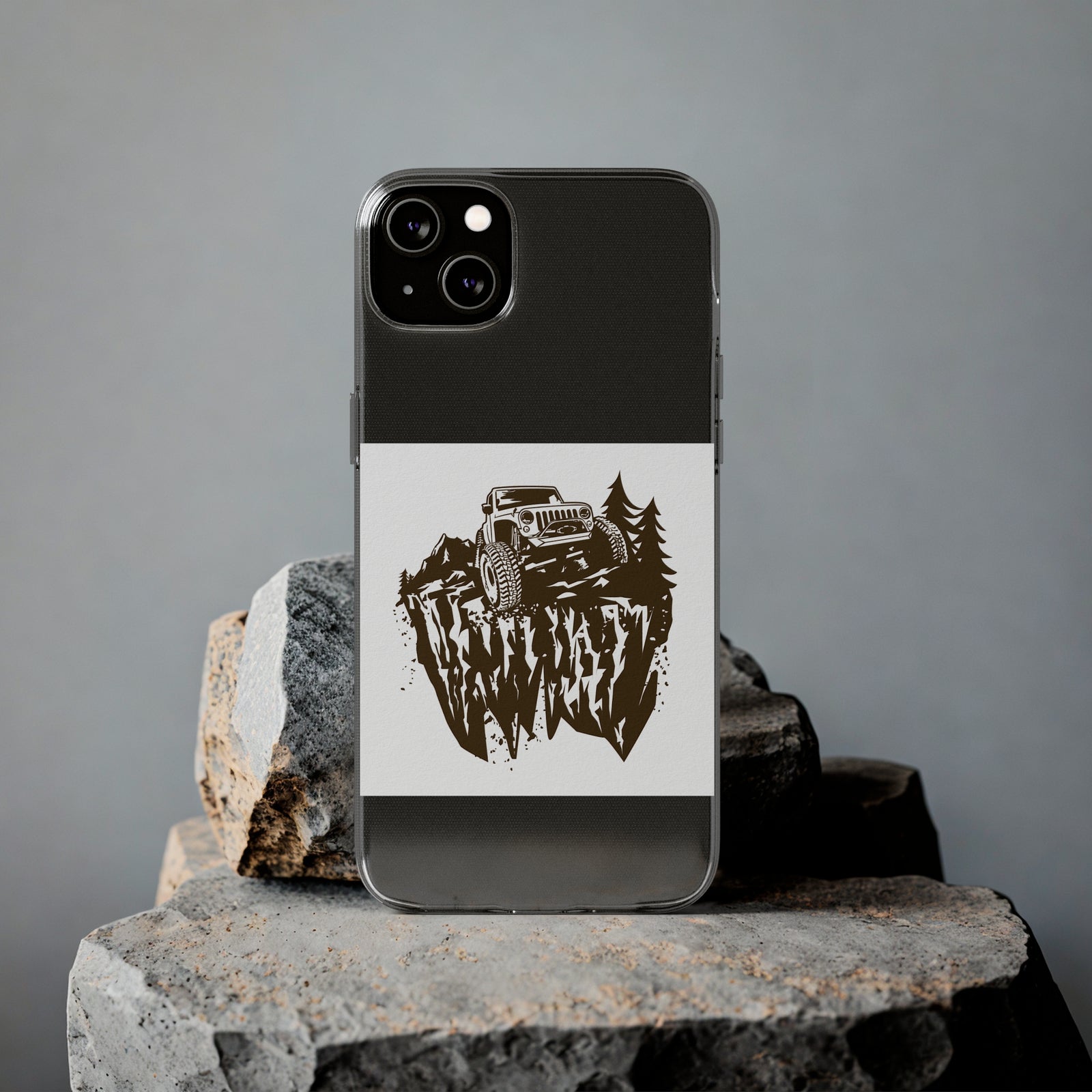 Phone case with Jeep design on rocky surface, perfect for outdoor adventures and camping. Available at revlando.com.