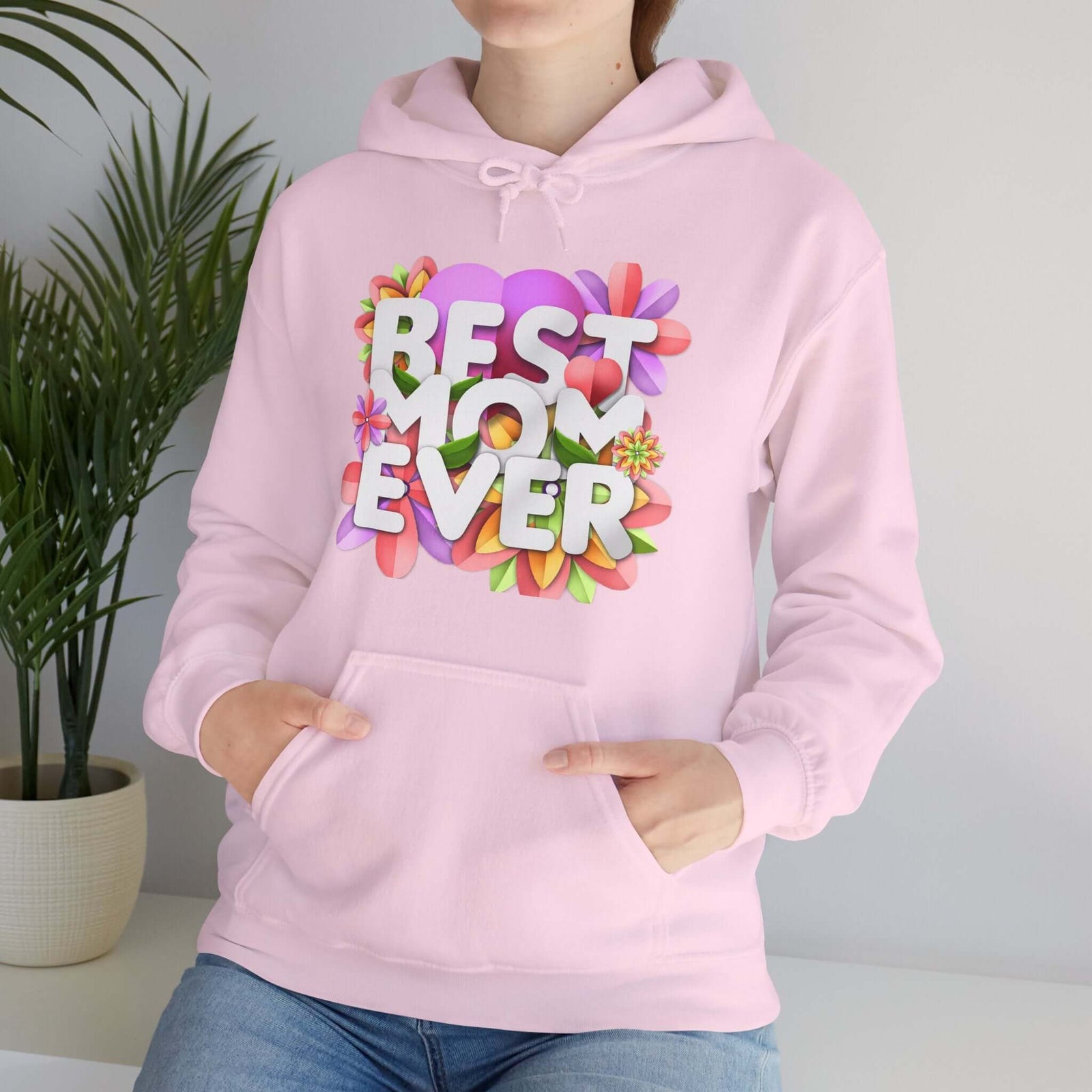 Pink floral hoodie with 'Best Mom Ever' design, perfect for outdoor adventures and casual outings.