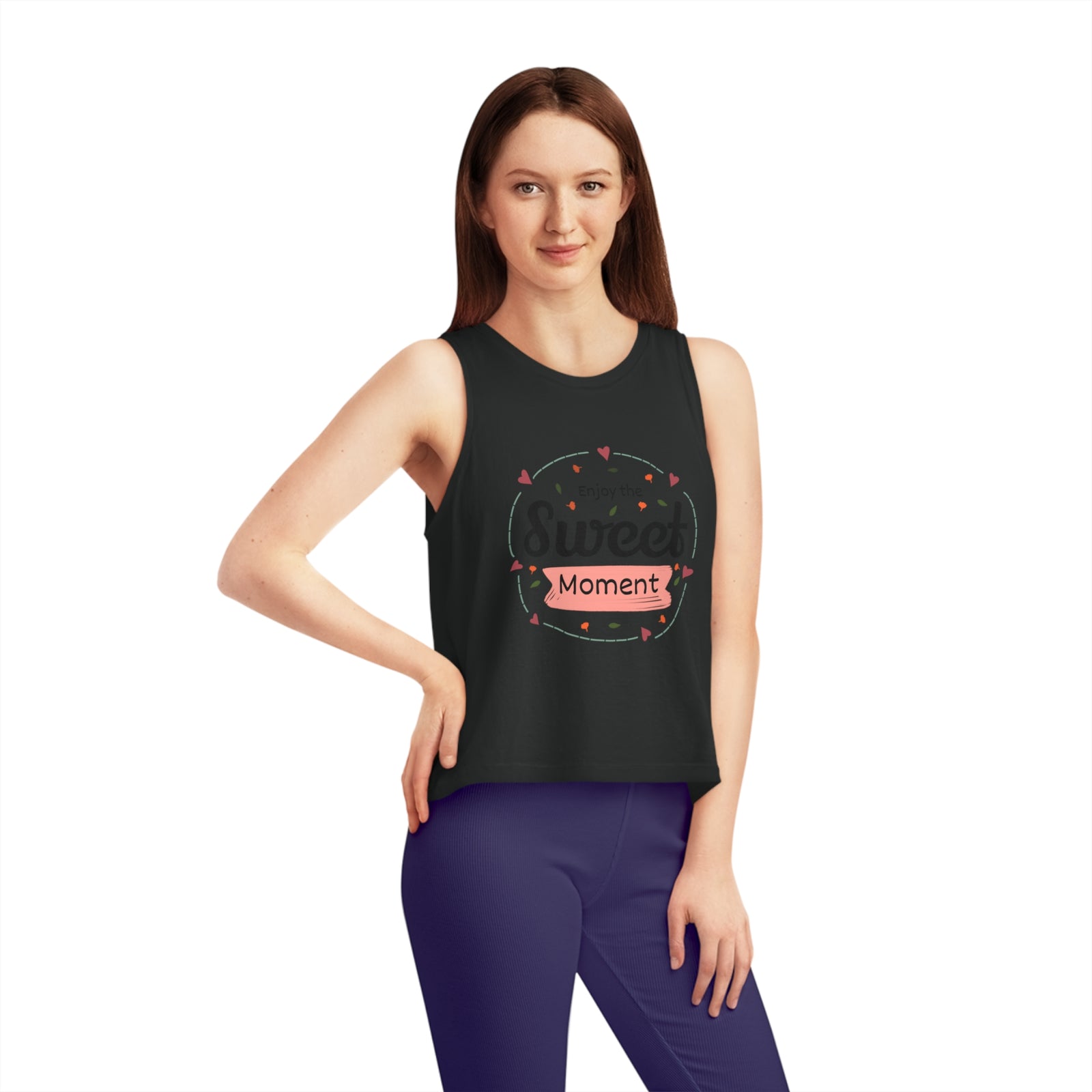 Woman in a cropped tank top with 'Sweet Moment' design, perfect for outdoor adventures, available at revlando.com.