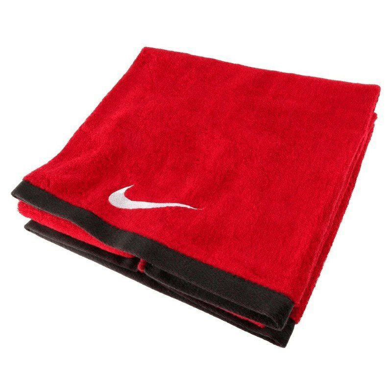 Red Nike Fundamental Tower M Towel folded, ideal for gym training, outdoor sports, adventure, and travel.