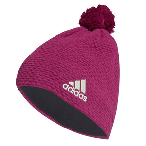 Adidas pink beanie with pompom, ideal for outdoor sports and adventures, providing warmth and style for winter travel.