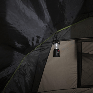 Inside view of High Peak Brixen 5.0 tent showing a lantern hanging from the ceiling, ideal for evening camping adventures.