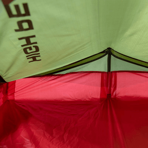 Interior view of High Peak Siskin 2.0 ultra-light tent showcasing ventilation and durable design for outdoor adventures.