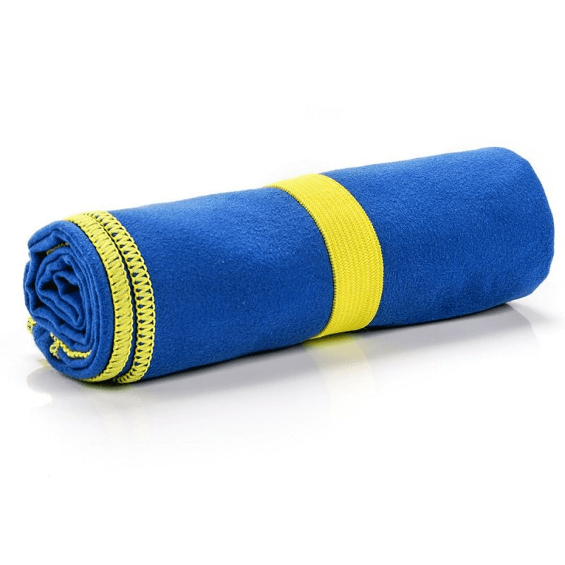 Rolled Meteor Navy Microfiber Towel with yellow elastic band, ideal for outdoor adventures, travel, gym, and home use.