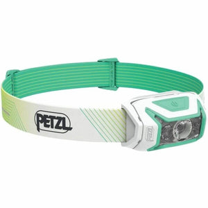 LED Head Torch Petzl E065AA02 in white and green, perfect for outdoor camping and adventure activities.