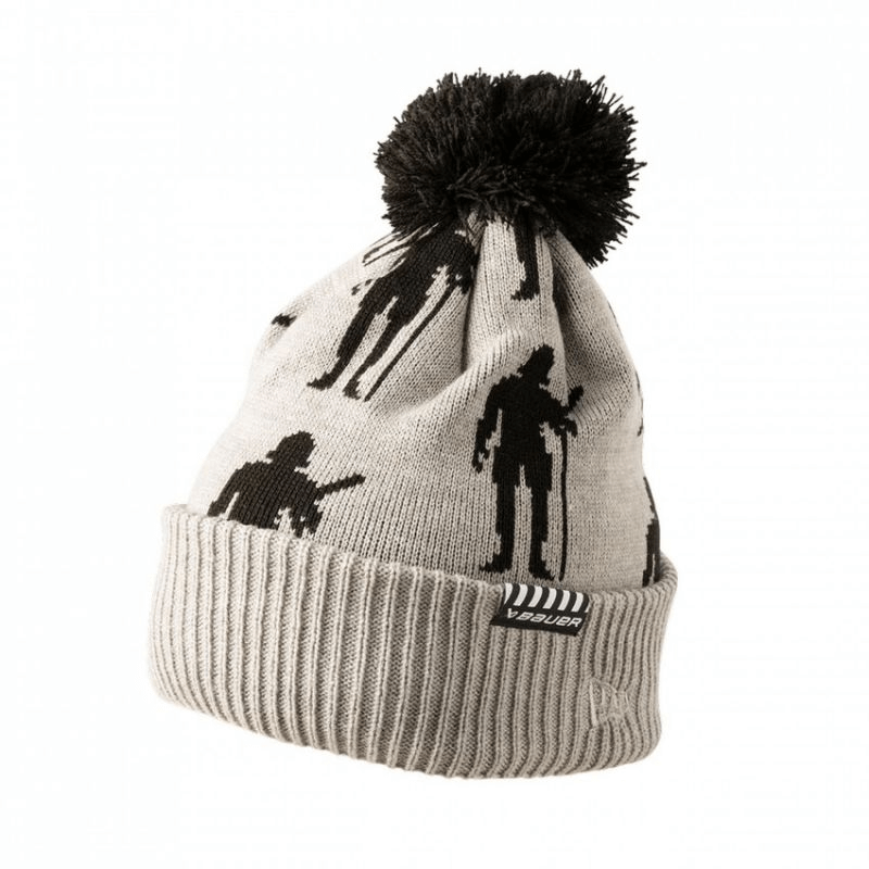 Bauer NE Knit Pom Jr Winter Hat for kids, warm gray knit with hockey design, perfect for outdoor adventures.