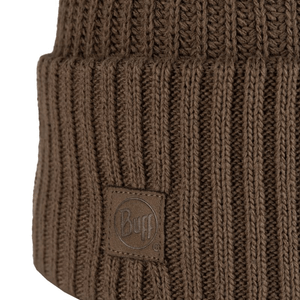 Buff Rutger winter hat beanie in brown, featuring ribbed texture and logo, perfect for outdoor adventures and travel.