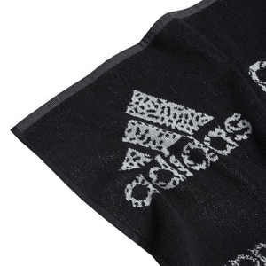 close-up of Adidas Branded HS2056 sports towel showcasing black and white logo design, perfect for outdoor and sports activities.