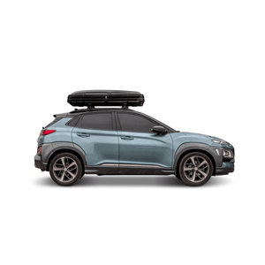 Offlander Fold 2 Sand Roof Tent mounted on a modern blue SUV, perfect for outdoor adventure travel.