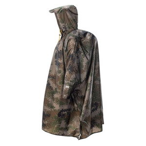 Stay Warm and Stylish with the Magnum Tundra Poncho Cape - Perfect for Any Adventure