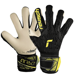 Reusch Attrakt Freegel Gold Finger Support Jr goalkeeper gloves for outdoor sports, featuring superior grip and finger protection.