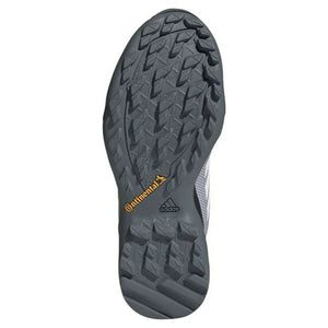 Adidas Terrex AX3 hiking trainers sole view, designed for outdoor adventures and camping, featuring durable traction.