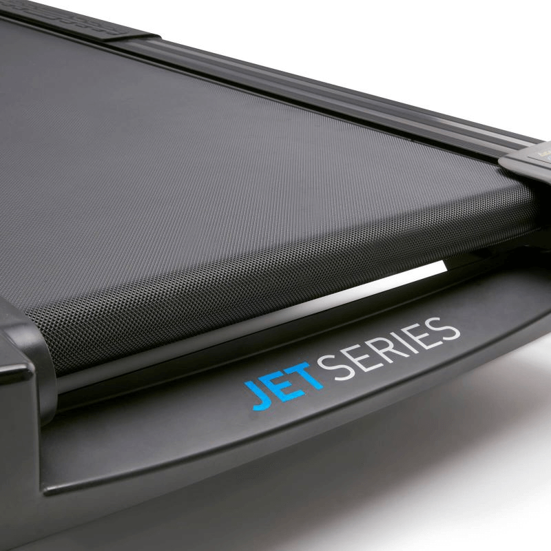 Close-up of Reebok JET Series treadmill showcasing advanced running surface and design features.