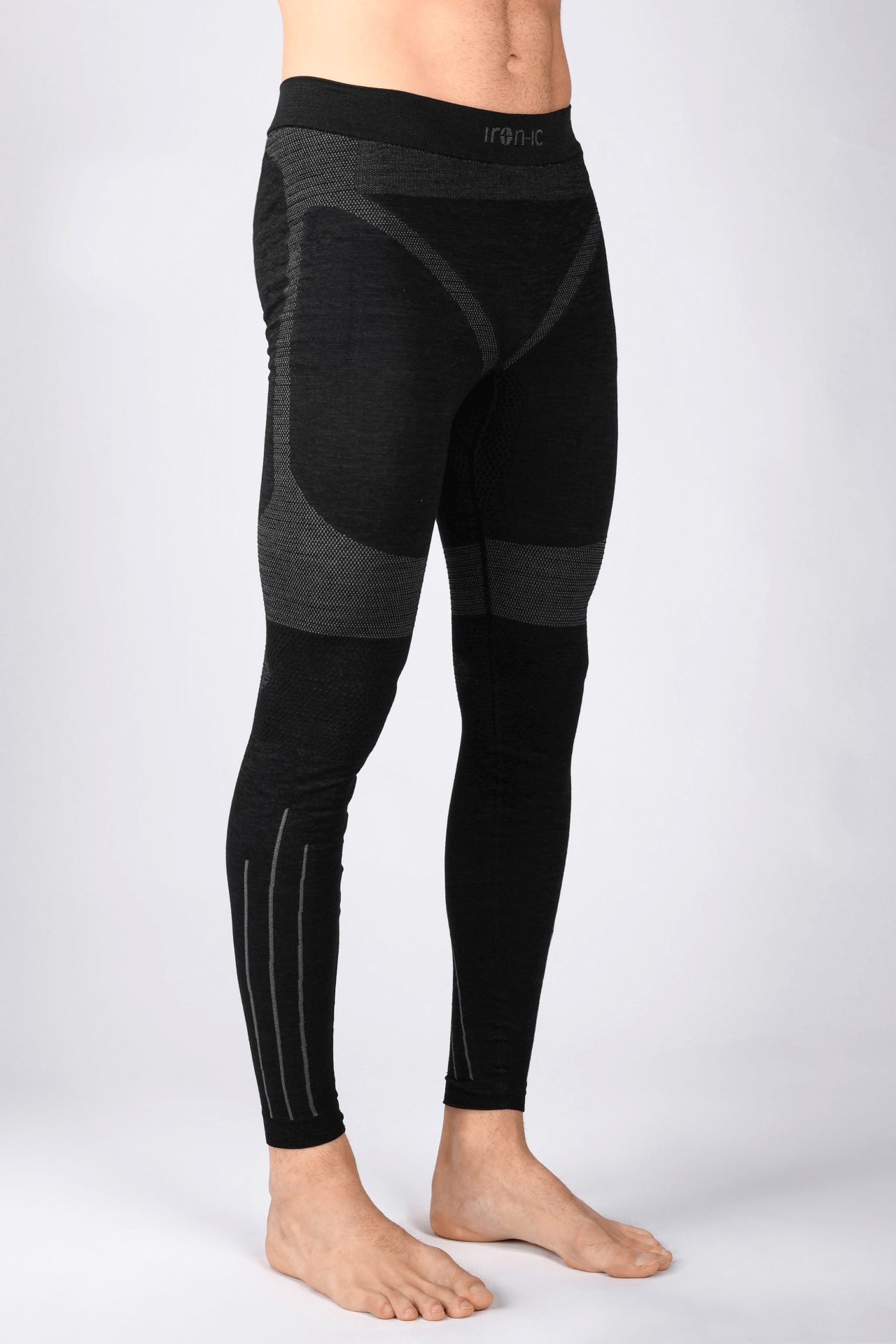 IRON IC men's thermal sports pants in black, designed for outdoor activities and winter sports, showcasing a comfortable fit.