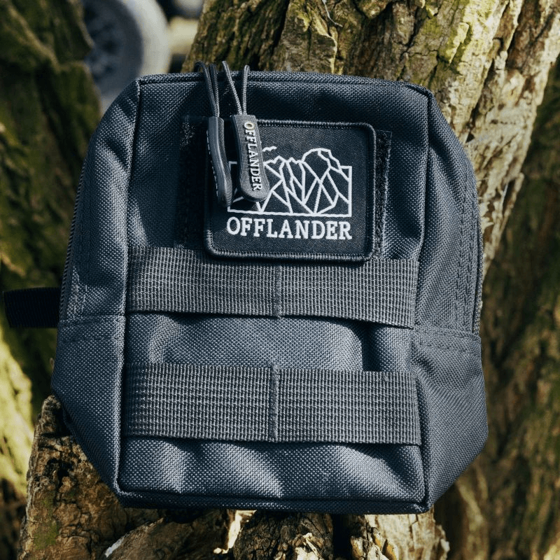 Offlander Molle Tactical Pouch in black, made of durable nylon, ideal for outdoor adventures and travel.