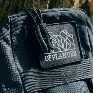 Offlander Molle Tactical Pouch close-up, showcasing durable nylon material and logo detail, perfect for outdoor adventures.