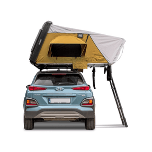 Offlander Fold 2 Sand Roof Tent mounted on a car, perfect for outdoor adventures and comfortable travel for two people.