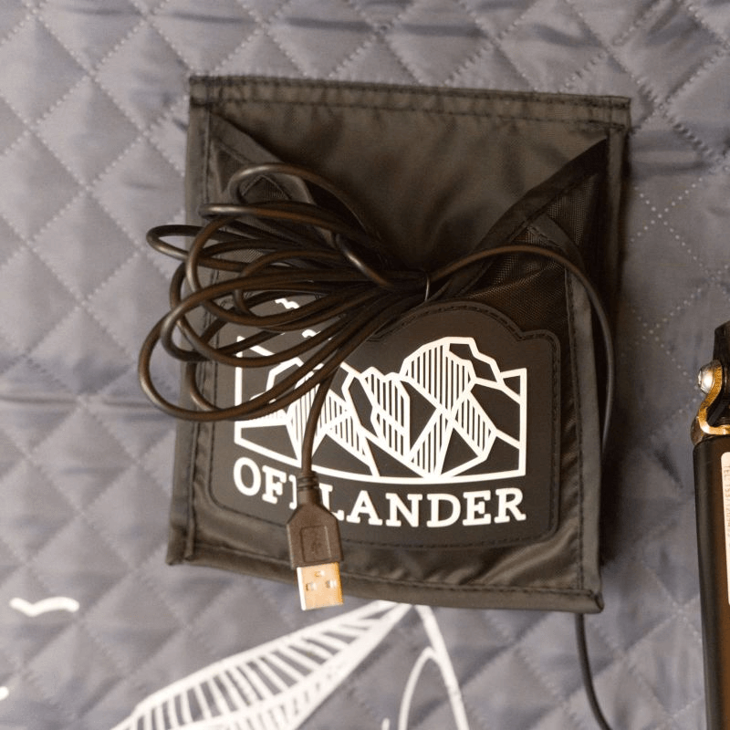 Offlander gear pouch with USB cable, perfect for outdoor adventures and travel convenience.