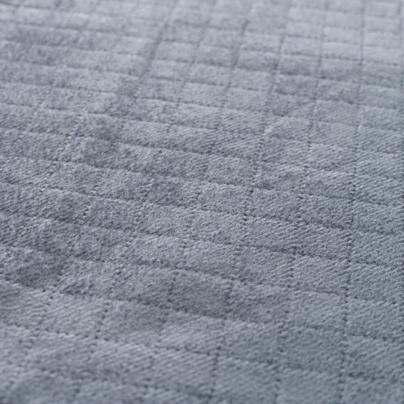 close-up of soft gray textured fabric, ideal for cozy outdoor tents and camping gear.