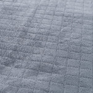 close-up of soft gray textured fabric, ideal for cozy outdoor tents and camping gear.