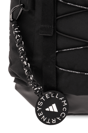 Close-up of ADIDAS by Stella McCartney backpack showing decorative lacing and logo tag, ideal for outdoor and sport adventures.