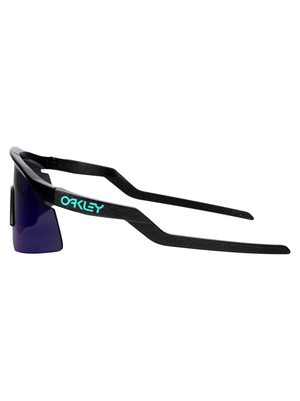 OAKLEY men's sports sunglasses showcasing UV protection and durable design for outdoor adventures and travel.