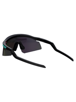 OAKLEY men's sports sunglasses designed for outdoor adventures with UV protection and durable frame.