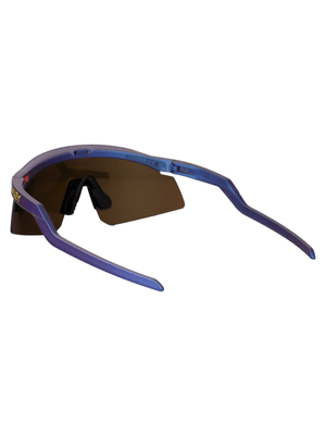 OAKLEY trendy winter snow sports goggles in stylish blue and brown design for outdoor adventures.