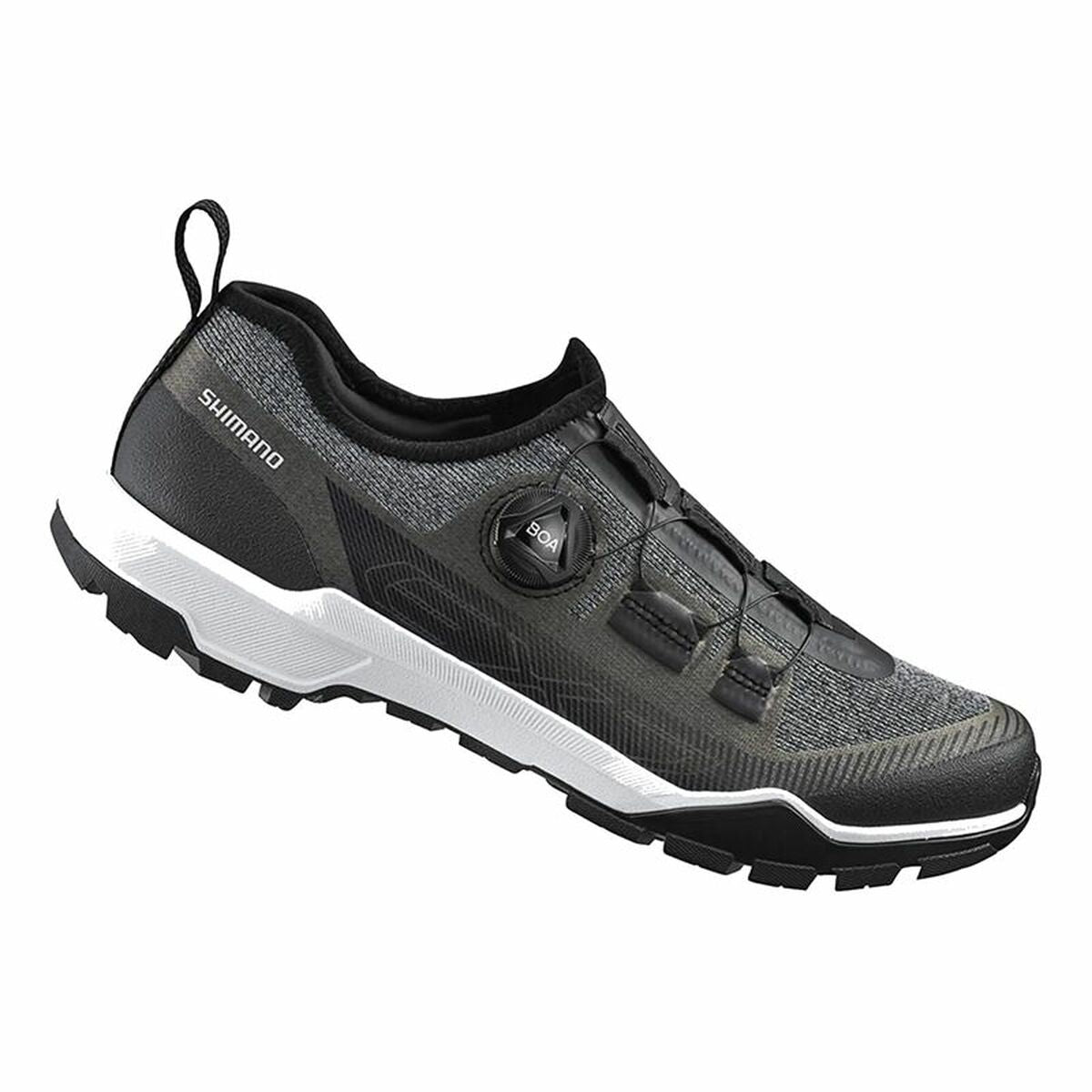 Black Shimano Ex7 cycling shoes for adults, perfect for outdoor adventures and camping, available at revlando.com.