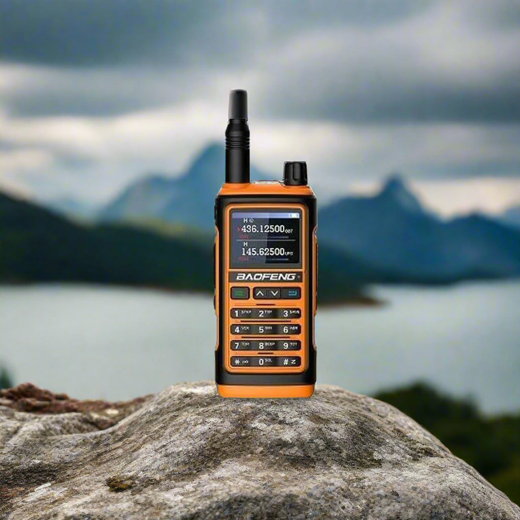 Baofeng UV-17E walkie-talkie on a rock, ideal for outdoor adventures and camping from revlando.com.