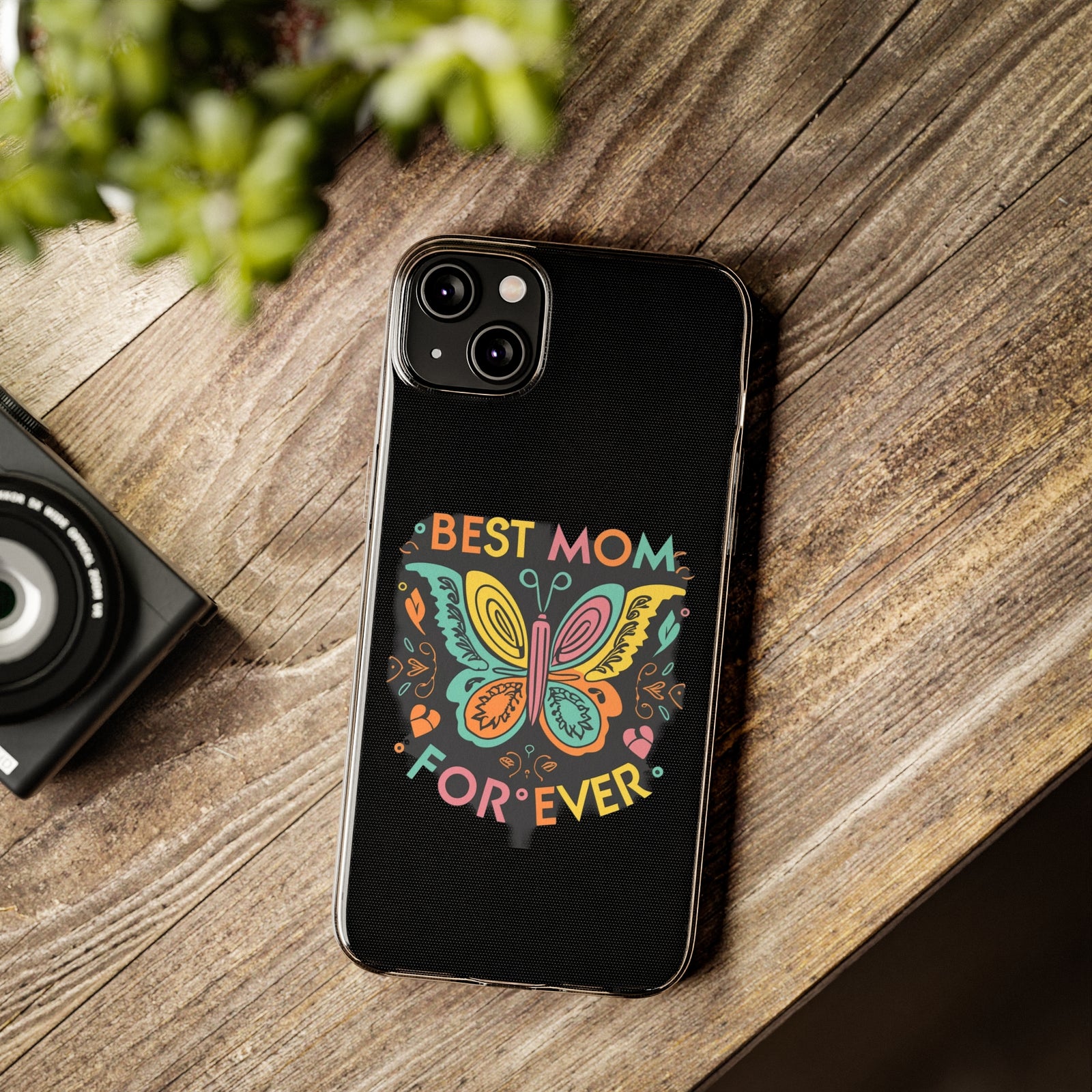 Colorful phone case design saying 'Best Mom Forever' with butterfly, ideal for outdoor adventures. Available at revlando.com.