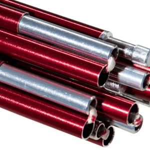 close-up of lightweight red and silver tent poles for outdoor camping gear and adventure equipment.