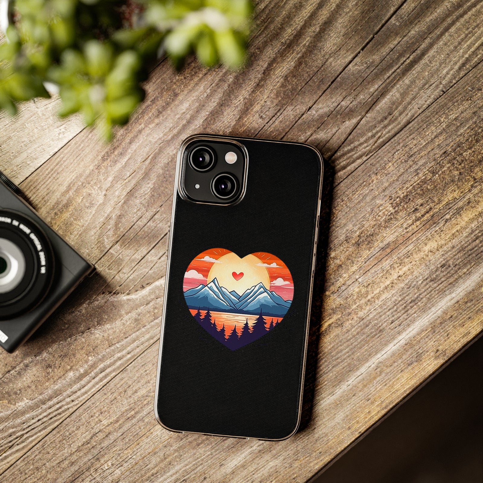 Phone case featuring a heart design with mountains and sunset, ideal for outdoor adventure lovers, from revlando.com.