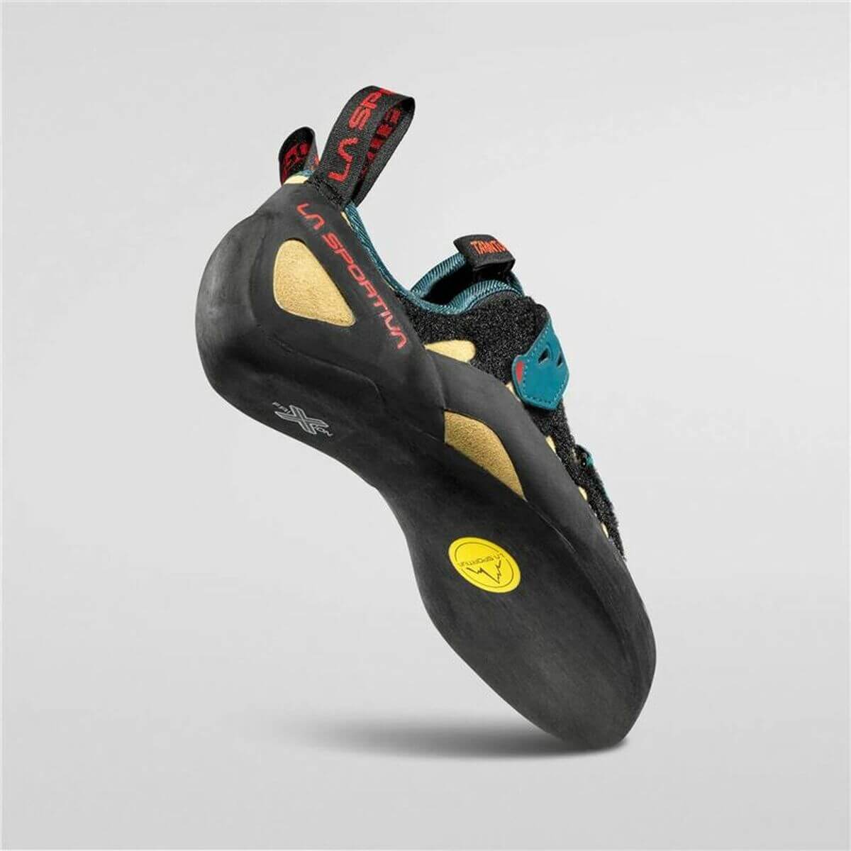 La Sportiva Tarantula climbing shoes in black and turquoise, ideal for outdoor adventures and camping, available at revlando.com.