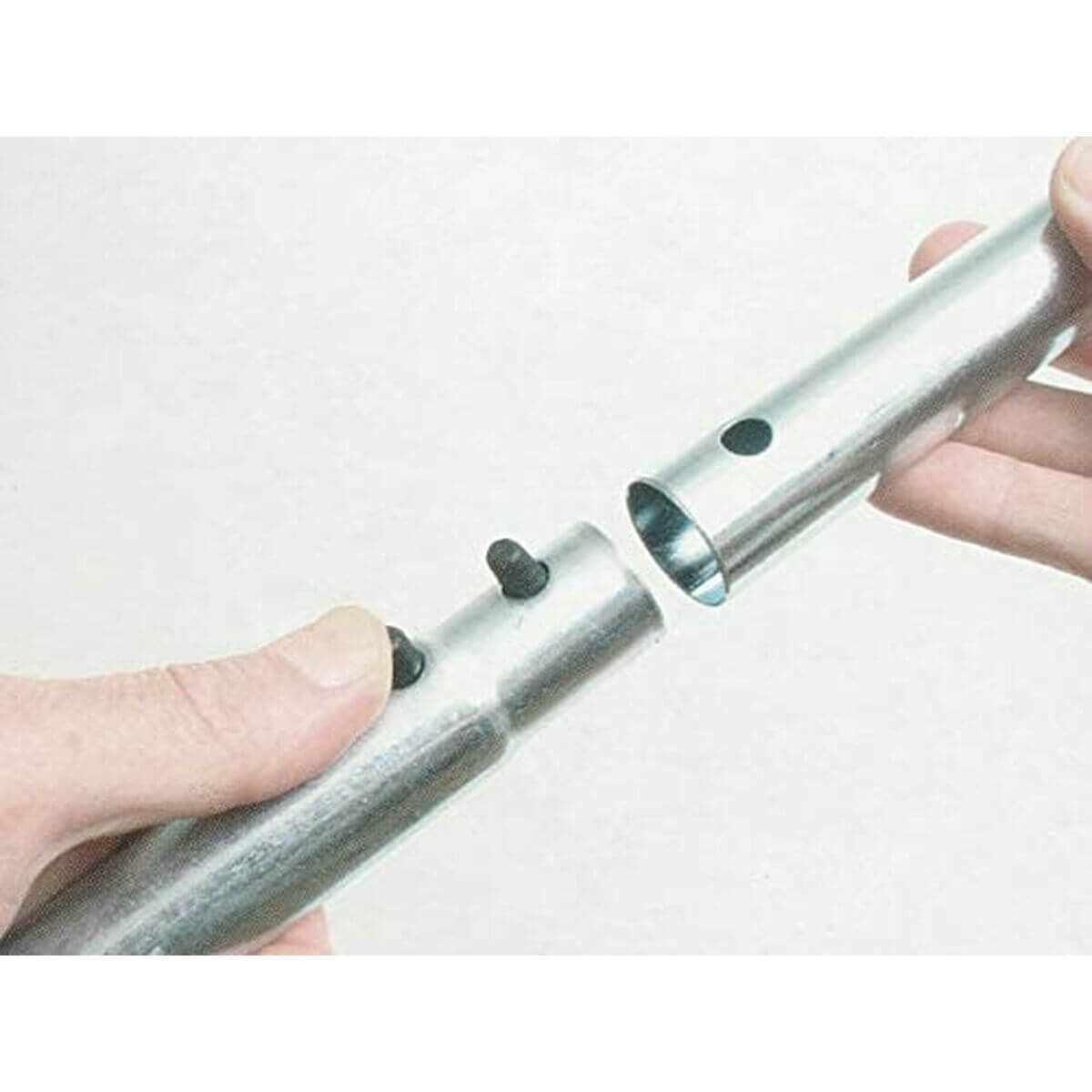 Black plastic snow shovel with metal handle, ideal for outdoor camping adventures, available at revlando.com.