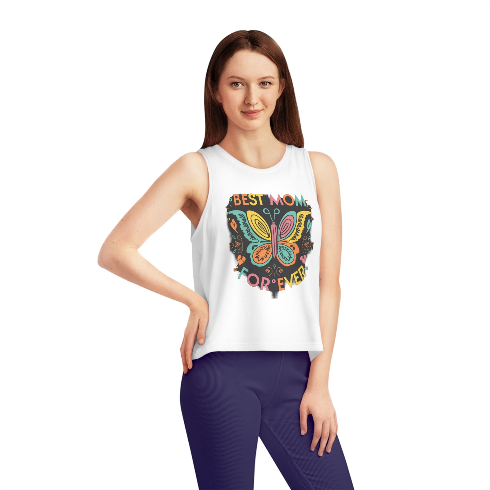Woman wearing a cropped tank top featuring 'Best Mom Forever' and butterfly design, perfect for outdoor adventures.
