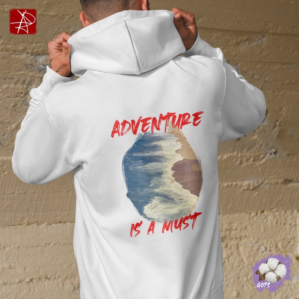 Unisex organic cotton hoodie with 'Adventure is a Must' text and ocean graphic, perfect for outdoor adventures.