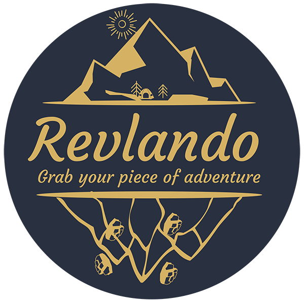 Revlando logo featuring mountains and adventure theme, promoting outdoor sports at revlando.com.